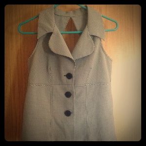 A black and white checkered dress top